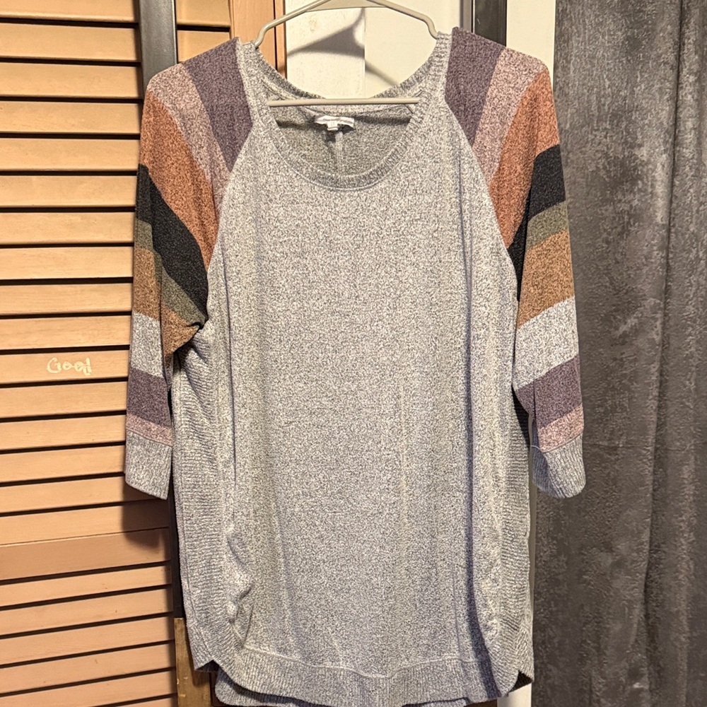 Maurice’s gray sweater